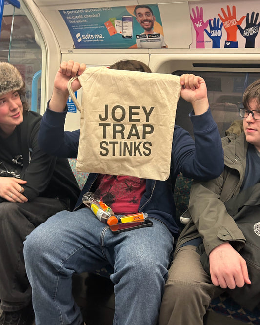 JOEY TRAP STINKS TOTE BAG